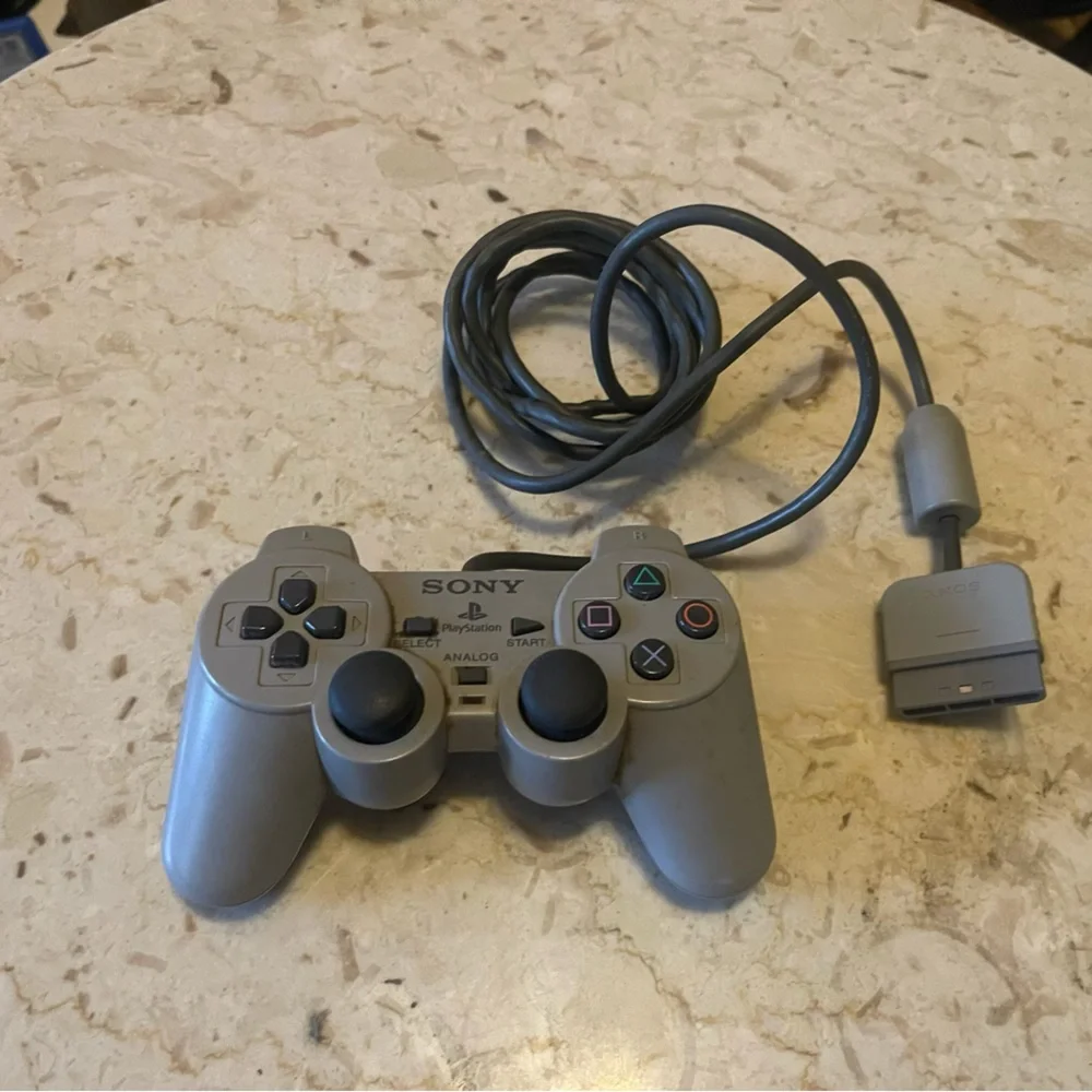 Sony PlayStation Classic in Gray with controller and cords